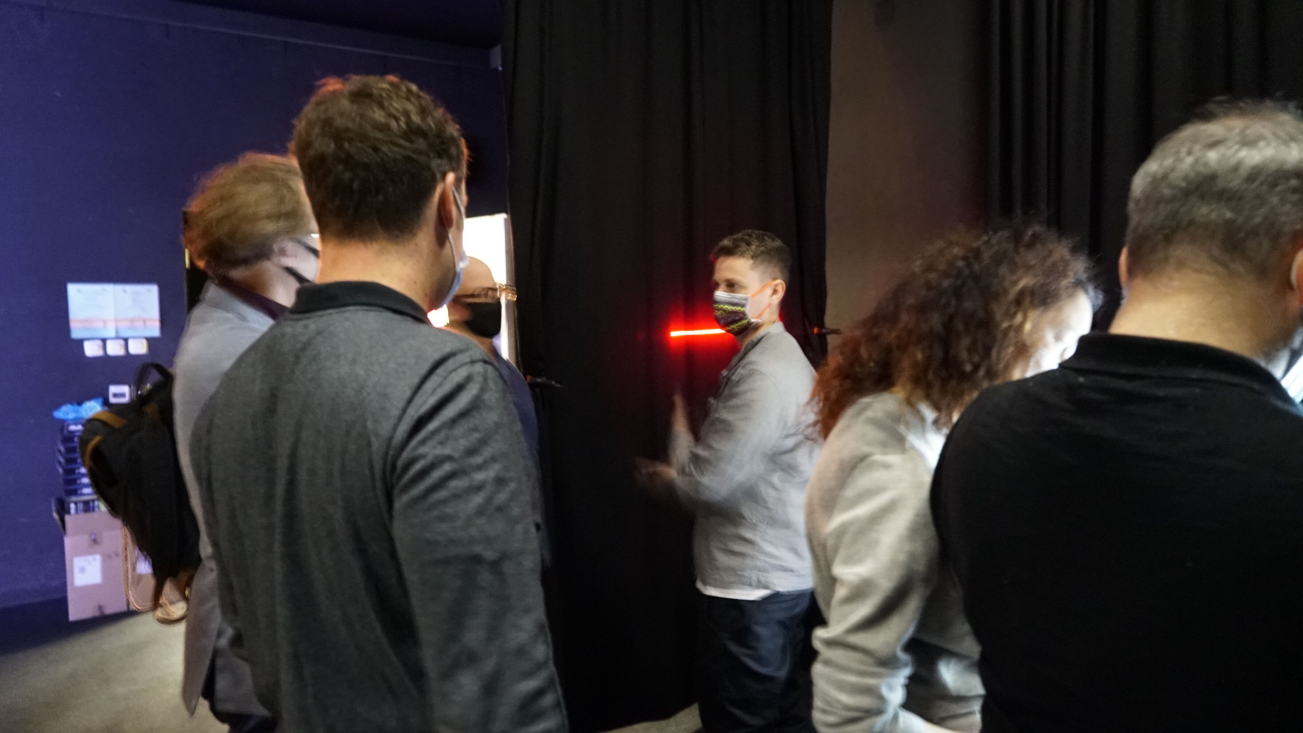 Jayson Haebich shows his demo Interactive Minimal latency Laser Graphics to guests.